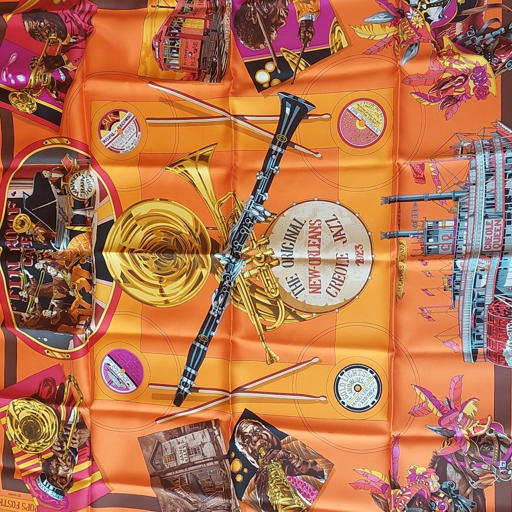 Orange silk Hermes scarf.